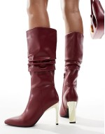 ‌Stylish ruched knee boots with gold heel in burgundy